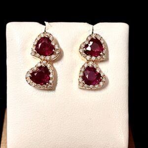 Orecchini in oro rosa con diamanti e rubini